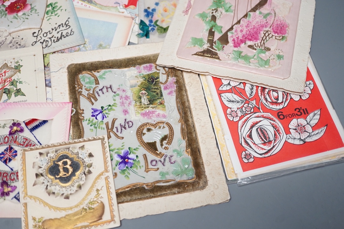 A collection of postcards and greetings cards